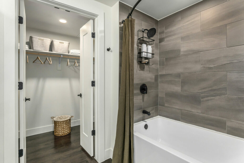 Designed for Modern Tastes - luxury apartment bathroom interior with spacious walk-in closet